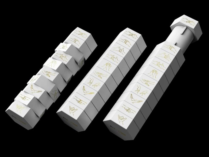 Geometric bottle packaging makes you solve a puzzle before you can open it