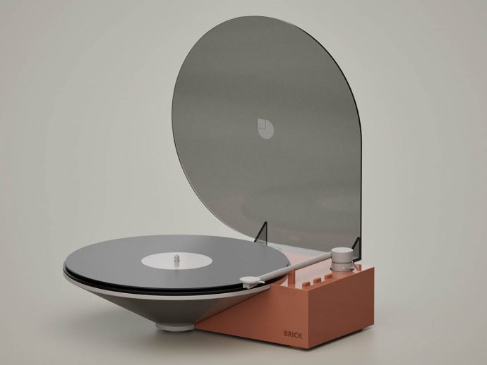 This Memphis-inspired turntable seemingly plays the vinyl record floating in mid-air