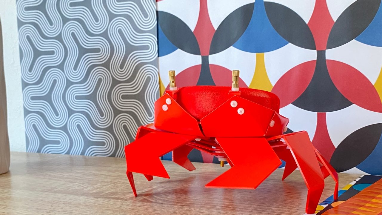 Origami and crab inspired speaker holder adds a simple beauty to