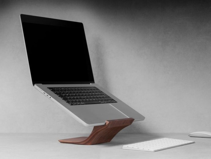 Sculptural Wooden MacBook Stand Blends Art and Ergonomics for Modern Desks