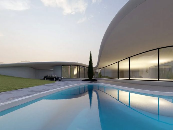 Minimal Cantilevered Home Disappears Into Its Surroundings With A Living Green Roof