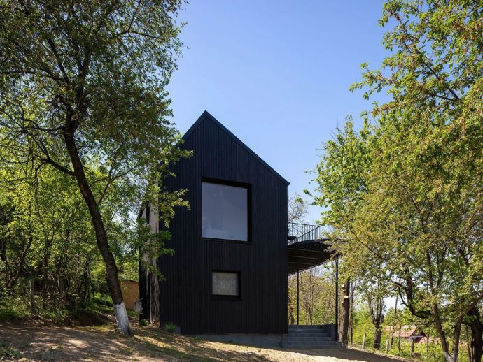This Tiny Cabin Is Designed For Sustainable & Serene Living Amid Romania’s Forested Hills