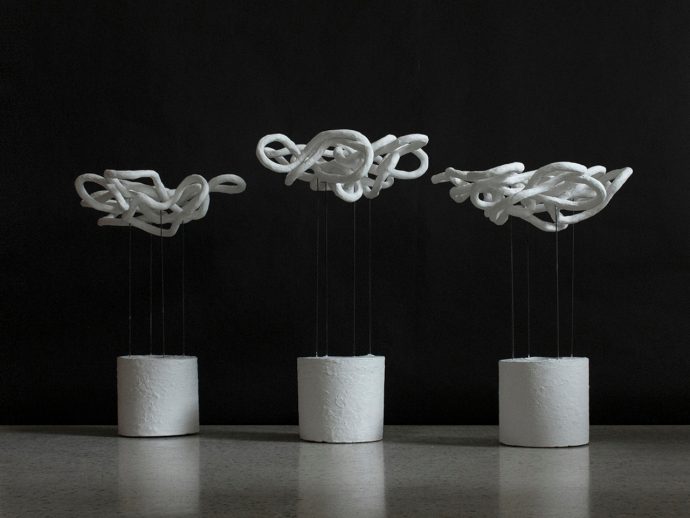 Sculptural LOOPS Lamp Creates Dramatic Shadows With Plaster and Sisal