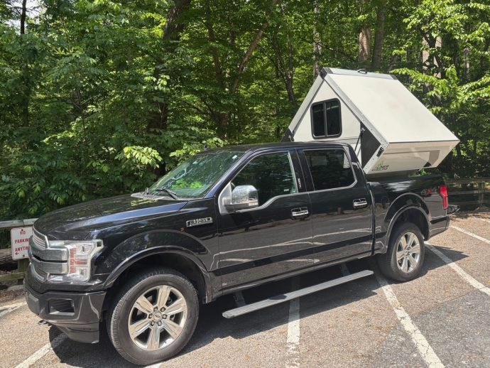 This hard-sided, A-frame aluminum truck camper is easily the lightest in its category