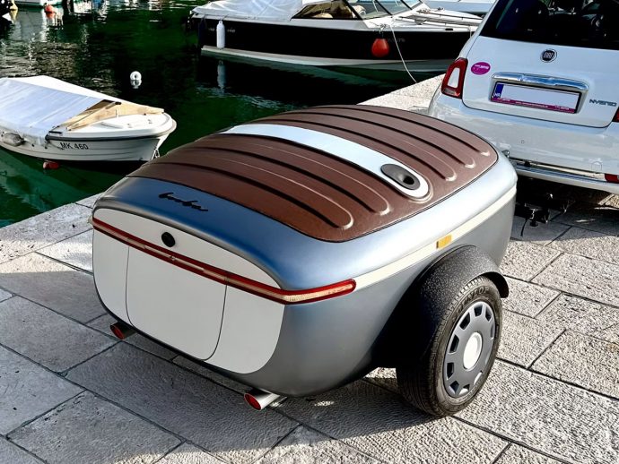 This compact trailer’s clamshell design unfolds and inflates into cozy base camp in matter of minutes