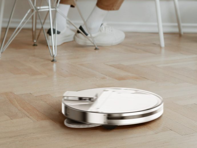 This Nothing-inspired Transparent Robot Vacuum Concept Doubles as Furniture