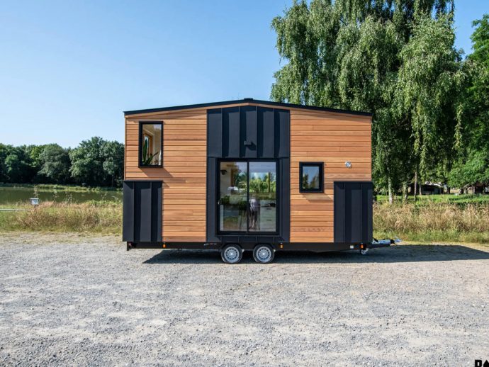 This Tiny House Looks Impossibly Small Outside But Hides A Full Sewing Studio Inside