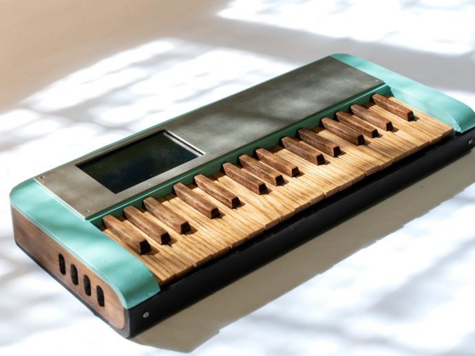 Someone Built a Working Synth From Cardboard and Walnut Keys