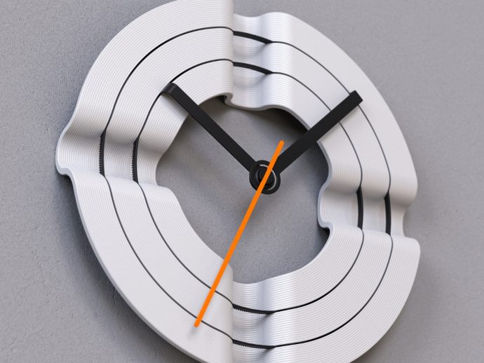 This 3D-Printed Clock Uses Orbital Rings to Tell Time
