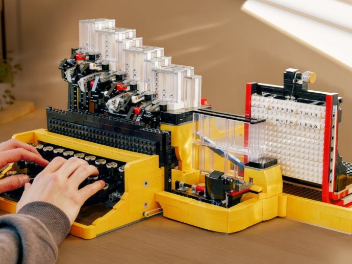 A mechanical LEGO Typewriter that types using Gravity, not ink