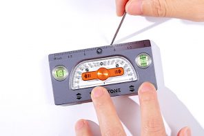 This Pocket Titanium Ruler Has a Level, Protractor, and Pen Built In