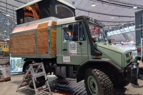 This Unimog-based wooden cabin with pop-up roof tent is built for the wilderness