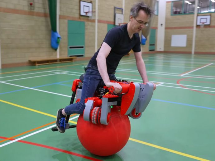 This Self-Balancing Electric Bike Rolls on a Single Giant Ball and Moves in Any Direction