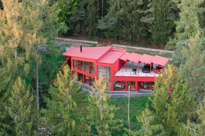 This Red House Buried in a Czech Forest Is the Opposite of Every Forest Home You’ve Ever Seen