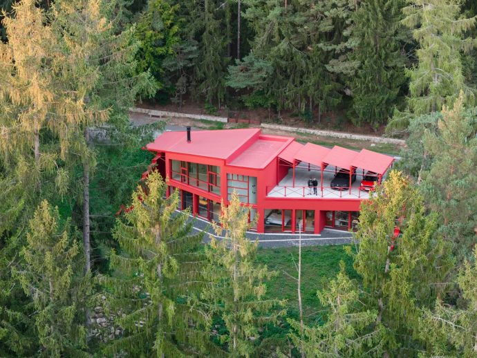 This Red House Buried in a Czech Forest Is the Opposite of Every Forest Home You’ve Ever Seen