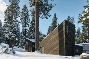 Four Dark Cedar Volumes Stepping Down a Tahoe Slope — This Is What a Smart Cabin Looks Like