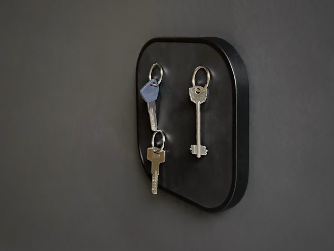 These Wood and Leather Wall Holders Swap Hooks for Hidden Magnets
