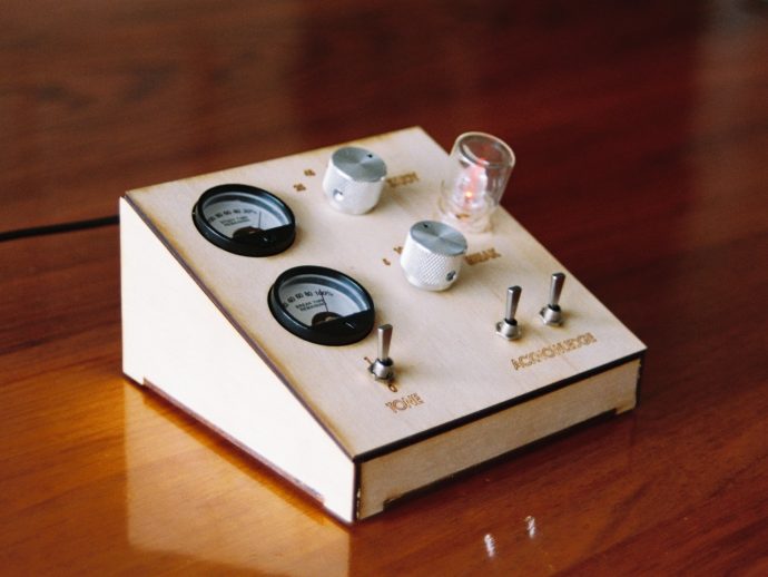 This $145 Wood and Brass Timer Finally Gets Your Phone Off the Desk