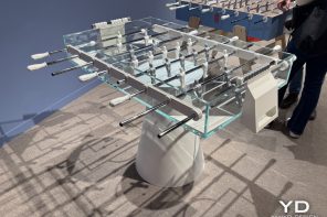 This transparent glass foosball table at Milan Design Week looks straight out of a 2000s sci-fi movie