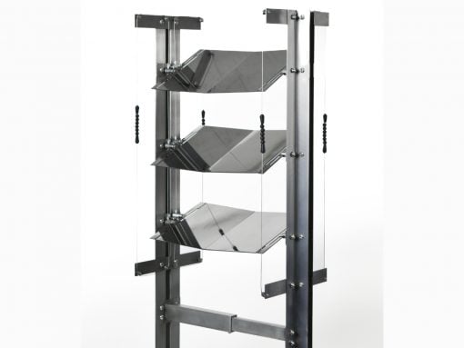 Three-tier chrome steel display rack with angled shelves and pulley cords on a metal frame