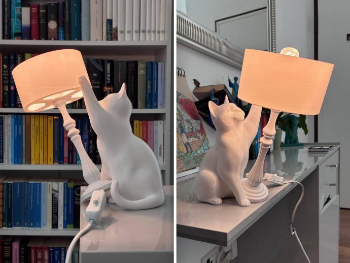 Someone Turned the “Cat Knocking Things Off Tables” Meme Into a 3D Printed Lamp and It’s Perfect