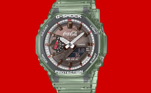 Green translucent G-Shock watch with Coca-Cola dial on a solid red background.