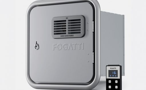 Industrial fogging/ventilation unit with a rounded square door and side digital controller labeled FOGATTI