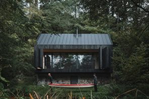 This Charred Timber Cabin on the Sázava River Was Built From the Ruins of the One It Replaced