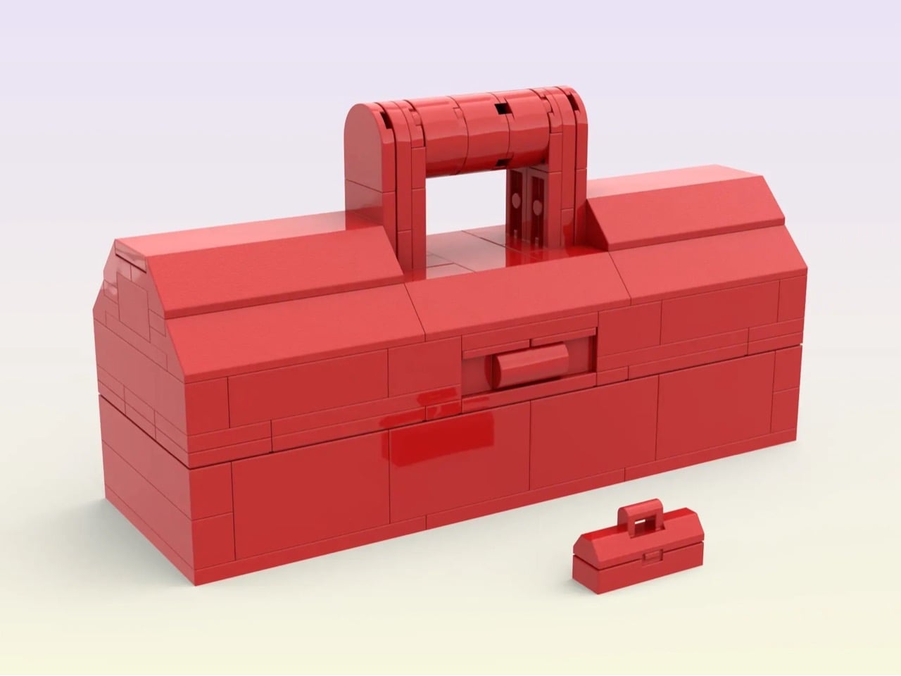 Brick-built red toolbox with a curved carrying handle on top and a smaller matching case beside it on a light gradient background.