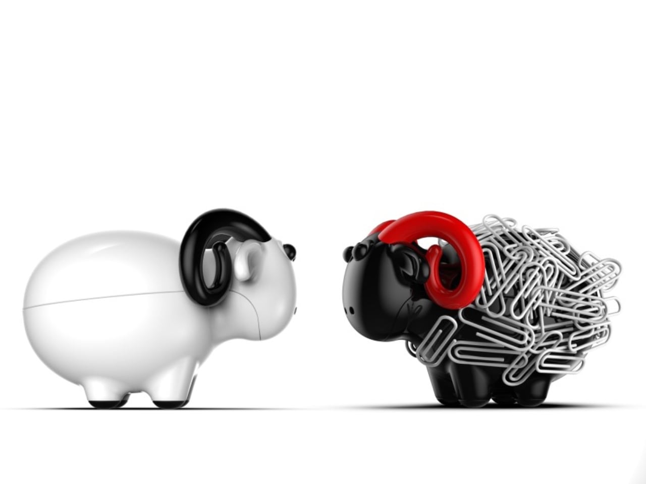White glossy sheep faces a black sheep wrapped in tangled paperclips, with a red collar.