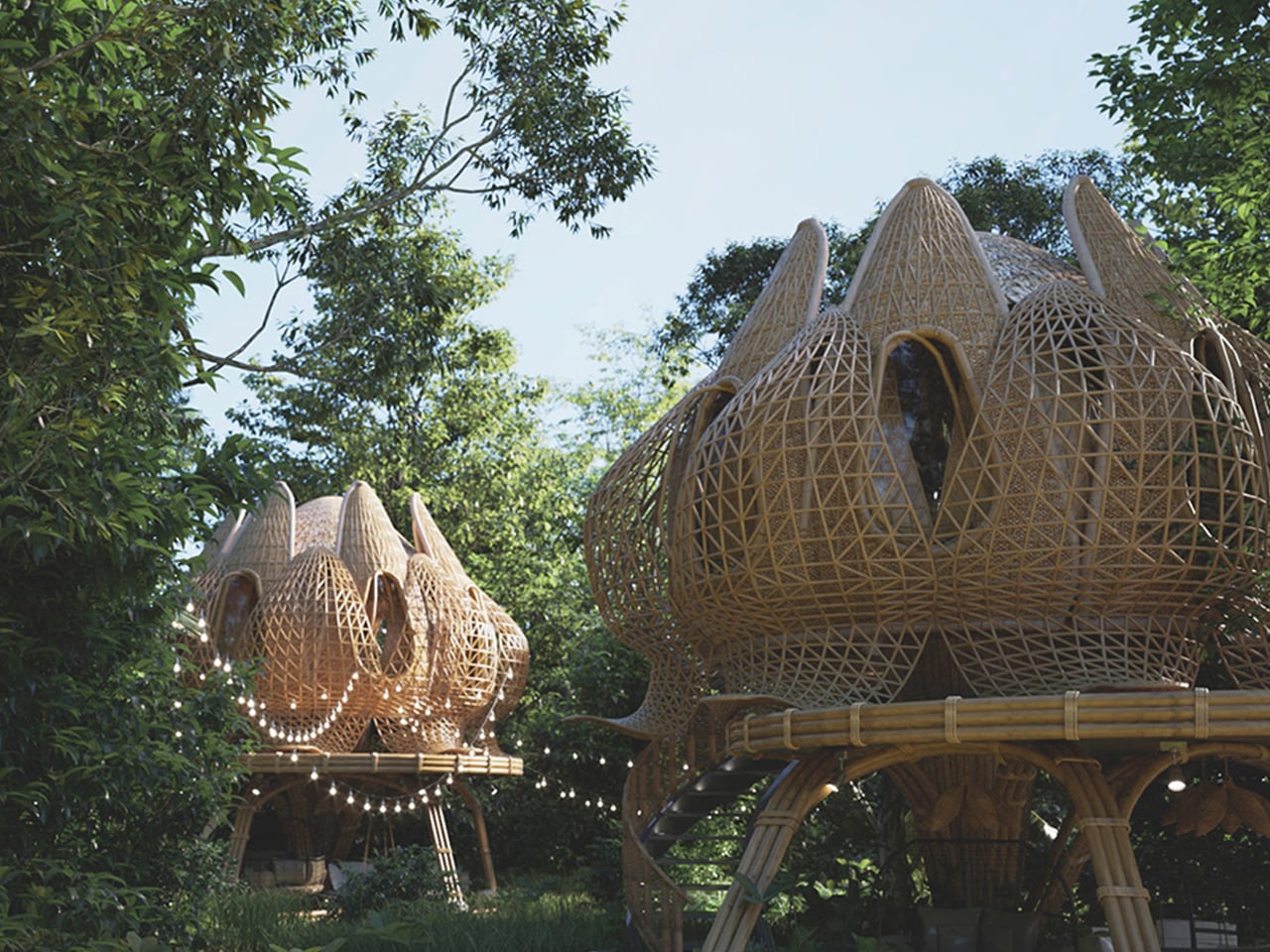 Two intricate bamboo pod structures on stilts in a forest garden, connected by a walkway with string lights. The lattice domes resemble lotus petals and blend with greenery.