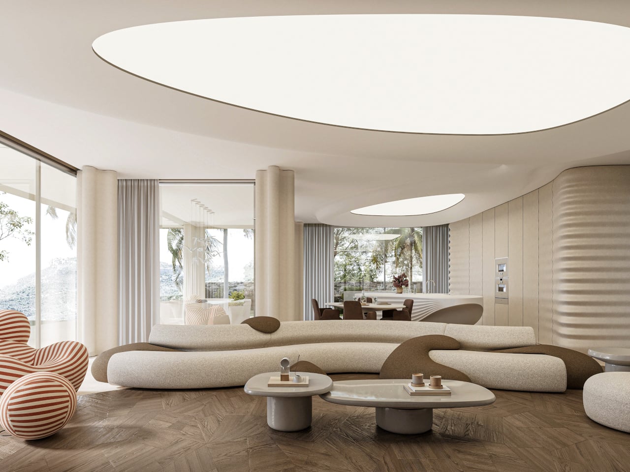 Contemporary open‑plan living room with curved cream sofas, round coffee tables, and sculptural seating; large windows and palm trees visible outside.