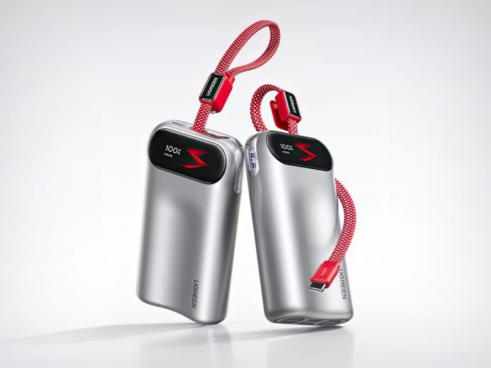 Two silver portable chargers with black screens displaying 100%, connected by red braided straps on a light background.