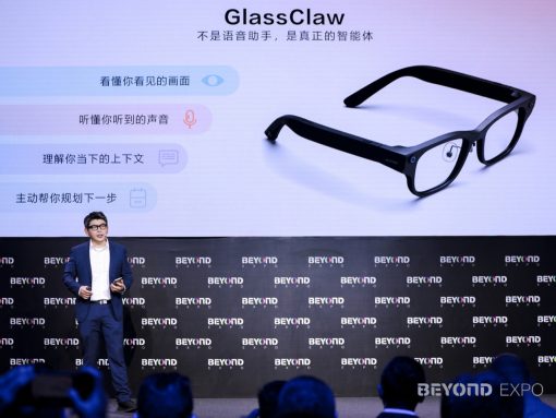 Male presenter in a blue suit on stage at Beyond Expo, with a large screen showing GlassClaw glasses and Chinese feature list.