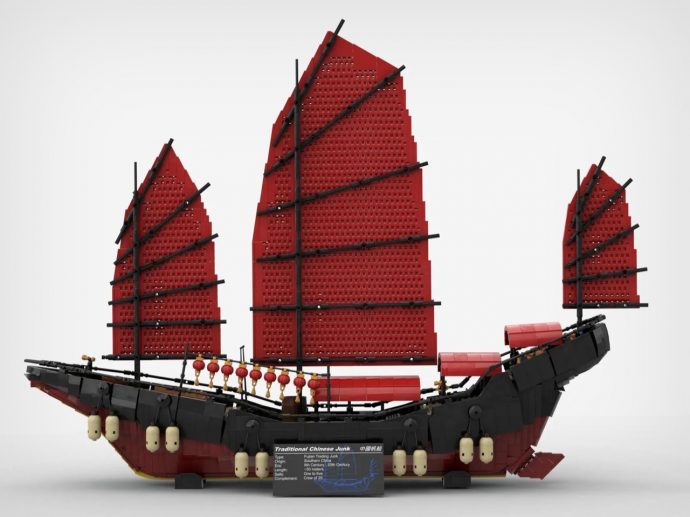 LEGO model of a traditional Chinese junk with bright red sails and a black hull.