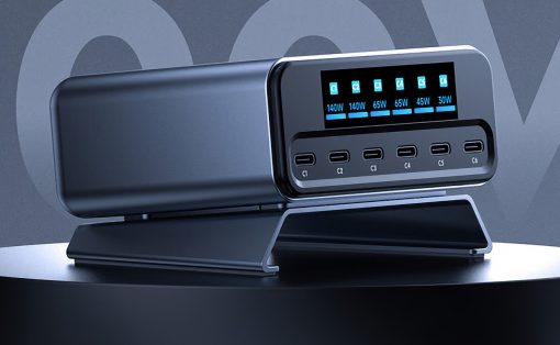 Six-port USB-C charging dock with a blue LED status panel showing per-port wattage on a rounded stand.