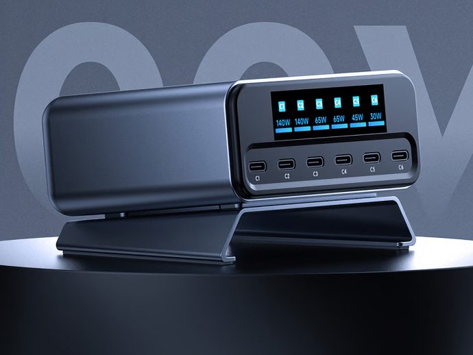 Six-port USB-C charging dock with a blue LED status panel showing per-port wattage on a rounded stand.