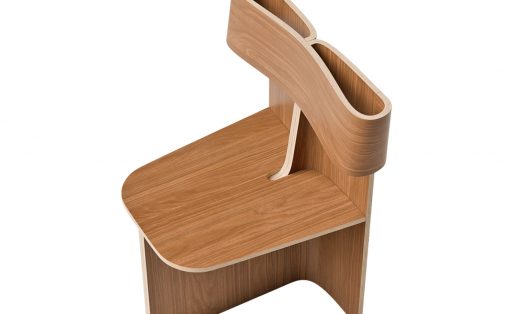 Contemporary wooden chair with looped, curved armrests forming a sculptural design.