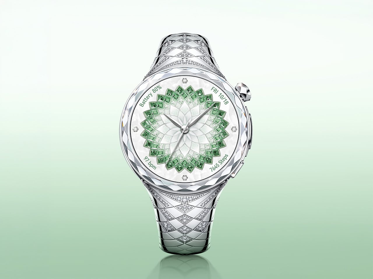Luxurious silver wristwatch with a green gem-encrusted dial and diamond-studded band on a pale green gradient background.