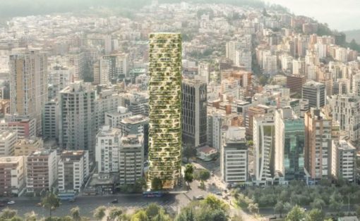 Tall skyscraper wrapped in greenery rising above a dense urban cityscape.