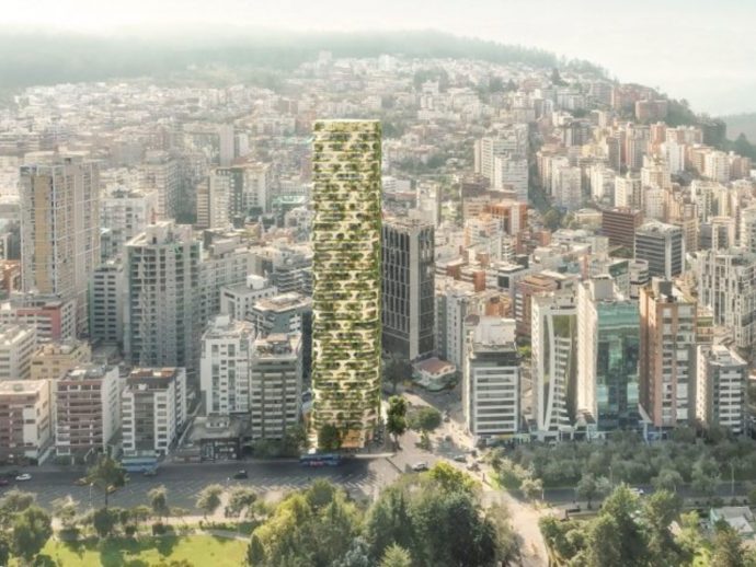 Tall skyscraper wrapped in greenery rising above a dense urban cityscape.