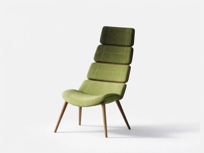 Green upholstered lounge chair with a tall, segmented backrest and four wooden legs.
