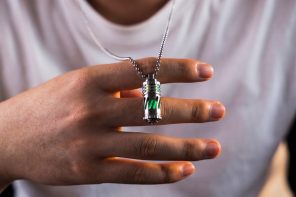 This Rotating Titanium Keychain Glows for 25 Years Without a Battery