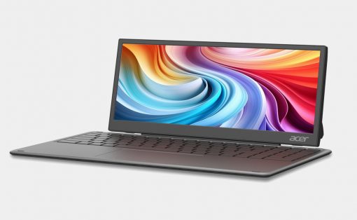 Open Acer laptop on a light background, gray chassis, keyboard visible, with a vibrant abstract wallpaper on screen
