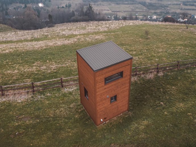 This Skyscraper-Style Tiny Home Packs Two Floors Into Just 107 Square Feet