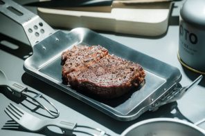 This Compact Grill Plate Cooks a Perfect Steak Over Any Heat Source & Packs Flat When You’re Done