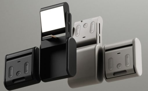 Four modular thermostat panels in black, gray, and white arranged in an abstract formation.