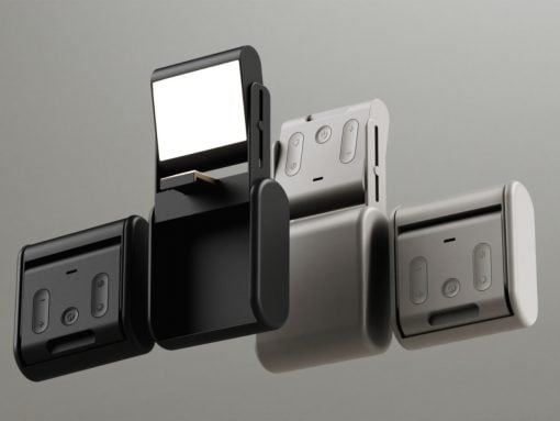 Four modular thermostat panels in black, gray, and white arranged in an abstract formation.