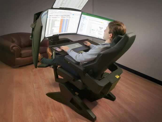 This zero-gravity motorized workstation replaces your setup to eliminate back pain and boost productivity