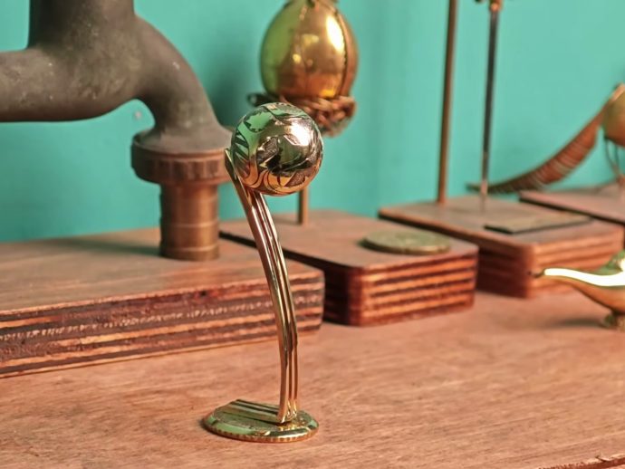 A Jewelry Artist Just Turned a 50-Cent Coin Into a World Cup Ball